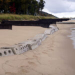 Sandsaver rebuilding beach on Great Lakes Lake Michigan