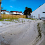 Beach side sand accumulation Gulf of Mexico